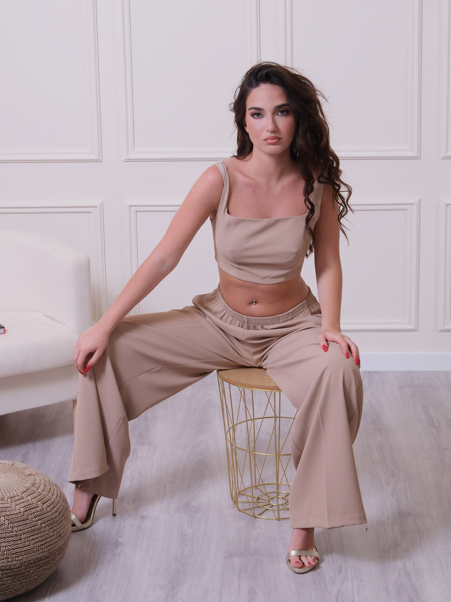 Pantaloni beige a palazzo con vita elasticizzata